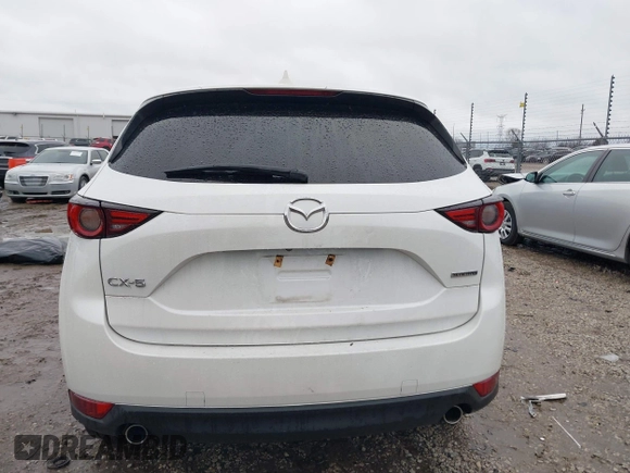 2021 Mazda CX-5 Grand Touring with VIN JM3KFADM4M1340141, listed as a IAAI auction lot 41194711 with 37,887 mi miles. Bid and sale history available at carsss.com. Image 16.