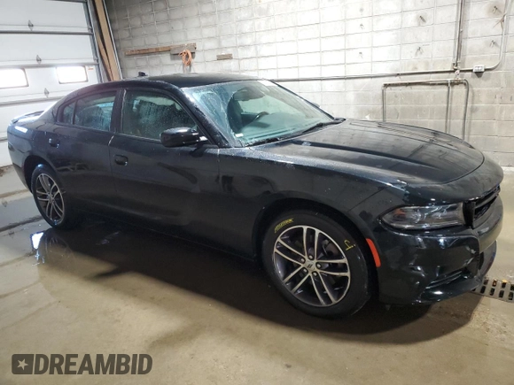 2019 Dodge Charger SXT with VIN 2C3CDXJG1KH757949, listed as a Copart auction lot 82231714 with 75,985 mi miles and Salvage Title. Bid and sale history available at DreamBid. Image 4.