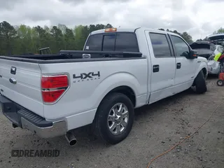 2013 Ford F-150 XL with VIN 1FTFW1ET9DKE31951, listed as a IAAI auction lot 41918223 with 235,469 mi miles. Bid and sale history available at carsss.com. Image 4.