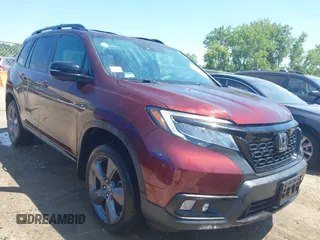 2020 Honda Passport Touring with VIN 5FNYF8H93LB006271, listed as a IAAI auction lot 42646553 with 71,961 mi miles and . Bid and sale history available at DreamBid. Image 1.