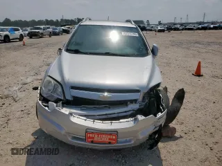 2012 Chevrolet Captiva Sport LTZ z VIN 3GNFL4E51CS522752, wystawiony jako Copart lot #57215795 z przebiegiem 123 522 mil mil oraz Szkoda całkowita • Salvage title. Historia ofert i sprzedaży dostępna na DreamBid. Obrazek 5.