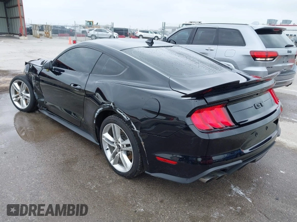 2021 Ford Mustang GT z VIN 1FA6P8CF2M5149643, wystawiony jako IAAI lot #41981794 z przebiegiem 57 345 mil mil oraz . Historia ofert i sprzedaży dostępna na DreamBid. Obrazek 3.