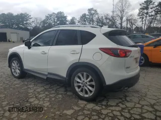 2015 Mazda CX-5 Grand Touring with VIN JM3KE2DY6F0504784, listed as a Copart auction lot 47671705 with 174,682 mi miles and Salvage Title. Bid and sale history available at carsss.com. Image 2.