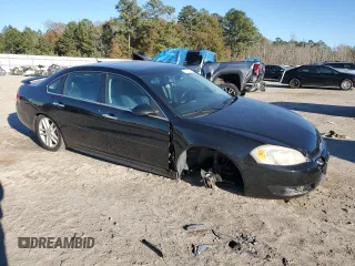 2014 Chevrolet Impala LTZ with VIN 2G1WC5E34E1121605, listed as a Copart auction lot 82705244 with 174,886 mi miles and Salvage Title. Bid and sale history available at DreamBid. Image 4.