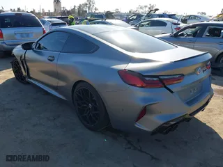 2023 BMW M8 Competition with VIN WBSAE0C0XPCM48877, listed as a IAAI auction lot 41676318 with 18,572 mi miles. Bid and sale history available at carsss.com. Image 3.