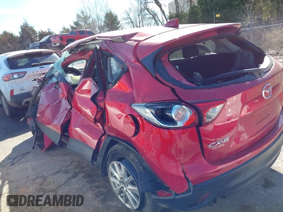 2014 Mazda CX-5 Touring z VIN JM3KE2CY2E0364488, wystawiony jako IAAI lot #41635188 z przebiegiem 127 688 mil mil oraz . Historia ofert i sprzedaży dostępna na DreamBid. Obrazek 6.