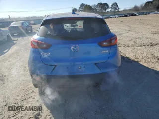 2016 Mazda CX-3 Touring z VIN JM1DKBC75G0114585, wystawiony jako Copart lot #42182235 z przebiegiem 34 725 mil mil oraz Szkoda całkowita • Salvage title. Historia ofert i sprzedaży dostępna na DreamBid. Obrazek 6.