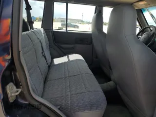 1998 Jeep Cherokee Sport with VIN 1J4FJ68S1WL149793, listed as a Copart auction lot 73976814 with 0 mi miles and Salvage Title. Bid and sale history available at carsss.com. Image 11.