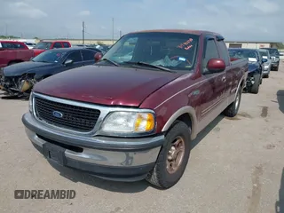 1997 Ford F-150 z VIN 1FTDX17W1VNB67040, wystawiony jako IAAI lot #41940240 z przebiegiem 99 816 mil mil oraz . Historia ofert i sprzedaży dostępna na DreamBid. Obrazek 2.