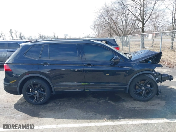 2023 Volkswagen Tiguan SE R-Line Black with VIN 3VVCB7AXXPM094621, listed as a IAAI auction lot 41737103 with 21,069 mi miles. Bid and sale history available at carsss.com. Image 13.