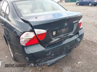 2006 BMW 3 Series 325xi with VIN WBAVD13516KT79513, listed as a IAAI auction lot 41609704 with 116,883 mi miles. Bid and sale history available at carsss.com. Image 6.