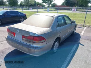2002 Honda Accord LX with VIN 1HGCG66532A170110, listed as a IAAI auction lot 42784361 with 200,115 mi miles and . Bid and sale history available at DreamBid. Image 4.