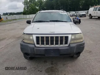 2004 Jeep Grand Cherokee Laredo z VIN 1J4GW48S14C288605, wystawiony jako Copart lot #60204815 z przebiegiem 247 816 mil mil oraz Szkoda całkowita • Salvage title. Historia ofert i sprzedaży dostępna na DreamBid. Obrazek 5.