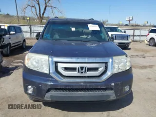 2011 Honda Pilot EX-L with VIN 5FNYF4H6XBB022917, listed as a IAAI auction lot 41864215 with 36,923 mi miles and . Bid and sale history available at carsss.com. Image 12.