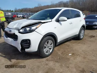 2018 Kia Sportage LX with VIN KNDPMCAC8J7372403, listed as a IAAI auction lot 41763496 with 92,651 mi miles and . Bid and sale history available at carsss.com. Image 2.