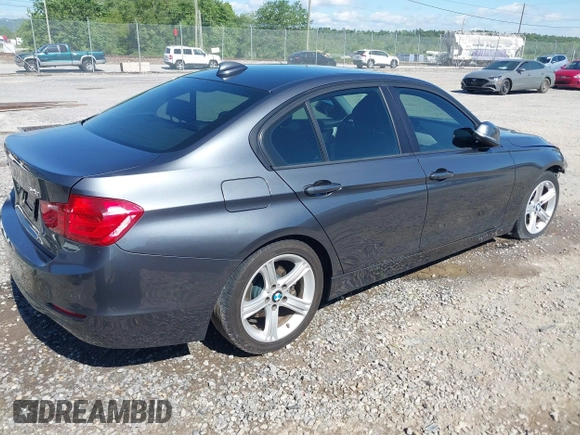 2014 BMW 3 Series 320i xDrive with VIN WBA3C3C54EP661409, listed as a IAAI auction lot 42182593 with 159,104 mi miles and . Bid and sale history available at DreamBid. Image 4.