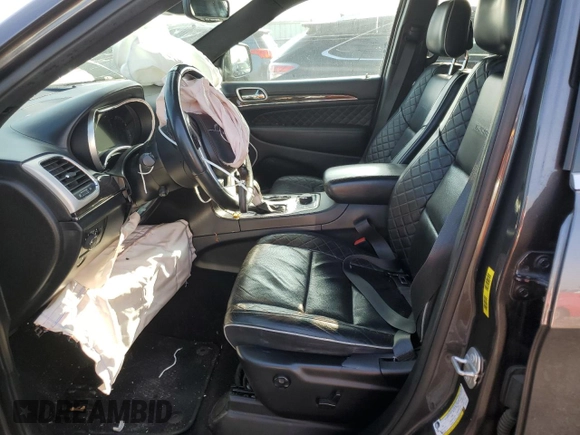 2019 Jeep Grand Cherokee Summit with VIN 1C4RJFJG9KC749707, listed as a Copart auction lot 83194534 with 111,566 mi miles and Salvage Title. Bid and sale history available at carsss.com. Image 7.
