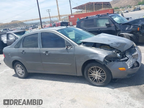 2007 Ford Focus S z VIN 1FAFP34N17W123378, wystawiony jako IAAI lot #42208033 z przebiegiem 183 803 mil mil oraz . Historia ofert i sprzedaży dostępna na DreamBid. Obrazek 14.