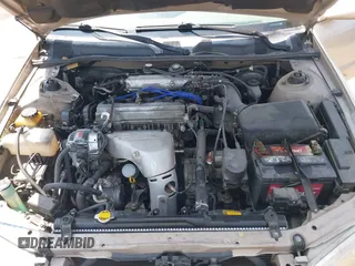 1999 Toyota Camry LE z VIN JT2BG22K1X0369726, wystawiony jako IAAI lot #42354218 z przebiegiem 213 828 mil mil oraz . Historia ofert i sprzedaży dostępna na DreamBid. Obrazek 10.