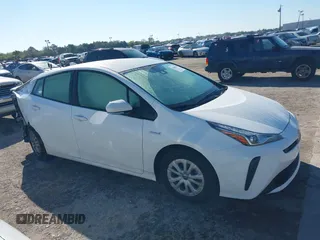2022 Toyota Prius L Eco with VIN JTDKAMFUXN3163123, listed as a IAAI auction lot 41666679 with 68,026 mi miles. Bid and sale history available at carsss.com. Image 13.