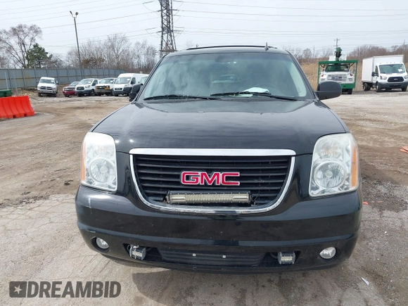 2013 GMC Yukon SLT with VIN 1GKS2CE01DR135135, listed as a IAAI auction lot 41828474 with 180,347 mi miles. Bid and sale history available at carsss.com. Image 12.