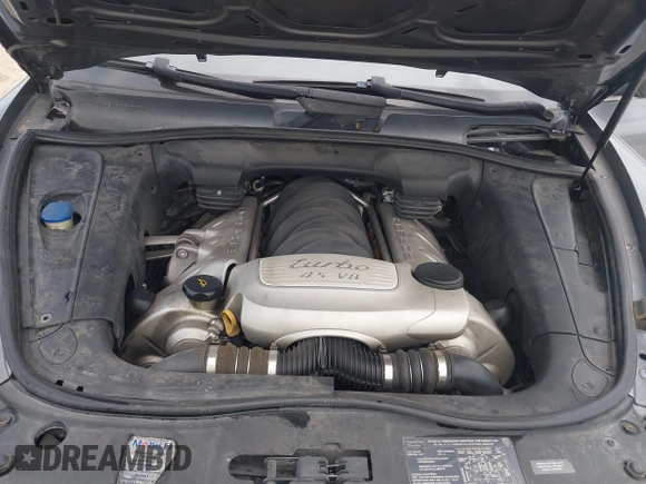 2005 Porsche Cayenne Turbo z VIN WP1AC29P25LA90019, wystawiony jako IAAI lot #42295764 z przebiegiem 164 927 mil mil oraz . Historia ofert i sprzedaży dostępna na DreamBid. Obrazek 10.