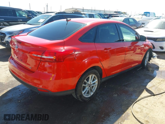 2015 Ford Focus SE z VIN 1FADP3F24FL283927, wystawiony jako IAAI lot #41755250 z przebiegiem Nie podano mil oraz . Historia ofert i sprzedaży dostępna na DreamBid. Obrazek 4.