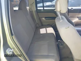 2013 Jeep Patriot Sport z VIN 1C4NJPBB8DD168770, wystawiony jako IAAI lot #41923641 z przebiegiem 104 747 mil mil oraz . Historia ofert i sprzedaży dostępna na DreamBid. Obrazek 8.