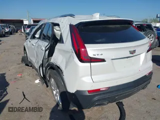 2022 Cadillac XT4 FWD Luxury with VIN 1GYAZAR48NF170949, listed as a IAAI auction lot 41857671 with 25,881 mi miles and . Bid and sale history available at carsss.com. Image 3.