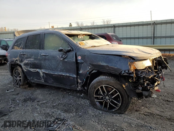 2017 Jeep Grand Cherokee Trailhawk with VIN 1C4RJFLT0HC694583, listed as a Copart auction lot 84421734 with 116,772 mi miles and Salvage title. Bid and sale history available at DreamBid. Image 4.