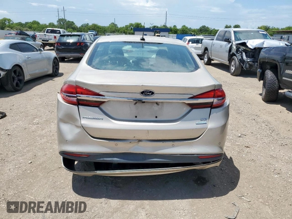 2017 Ford Fusion SE z VIN 3FA6P0HD7HR363913, wystawiony jako Copart lot #63848065 z przebiegiem 121 589 mil mil oraz Czysty tytuł • Clean title. Historia ofert i sprzedaży dostępna na DreamBid. Obrazek 6.