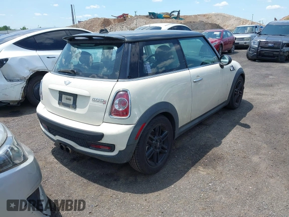 2012 MINI Hardtop S with VIN WMWSV3C5XCTY17852, listed as a IAAI auction lot 42402733 with 125,315 mi miles and . Bid and sale history available at DreamBid. Image 4.