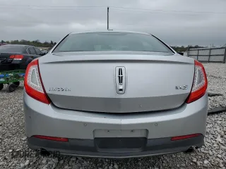 2013 Lincoln MKS with VIN 1LNHL9DK1DG604272, listed as a Copart auction lot 52880255 with 132,768 mi miles and Clean title. Bid and sale history available at DreamBid. Image 6.