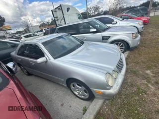 2002 Mercedes-Benz E-Class with VIN WDBJF70JX2B491915, listed as a Copart auction lot 86581554 with 206,224 mi miles and Clean Title. Bid and sale history available at carsss.com. Image 1.