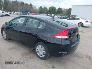 2010 Honda Insight LX with VIN JHMZE2H58AS014396, listed as a IAAI auction lot 42097224 with 167,505 mi miles and . Bid and sale history available at DreamBid. Image 3.