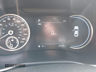 2023 Genesis G70 2.0T z VIN KMTG34TA7PU131917, wystawiony jako IAAI lot #42142928 z przebiegiem 32 158 mil mil oraz . Historia ofert i sprzedaży dostępna na DreamBid. Obrazek 7.