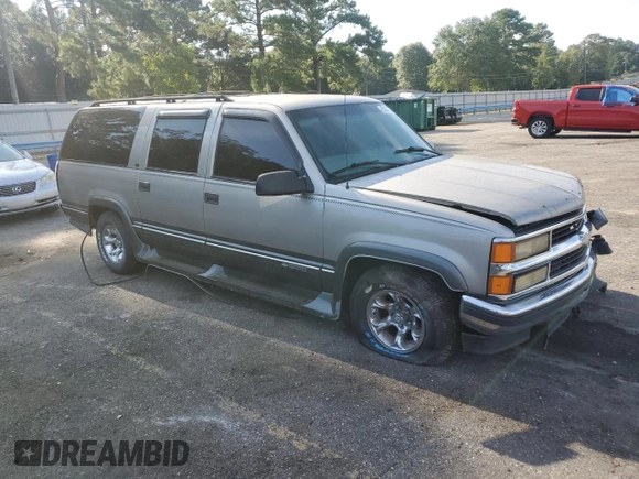 1999 Chevrolet Suburban with VIN 1GNEC16R9XJ490863, listed as a Copart auction lot 65938594 with 176,391 mi miles and Salvage Title. Bid and sale history available at carsss.com. Image 4.