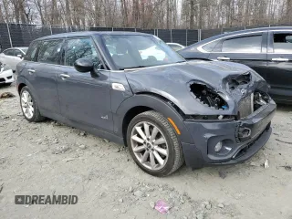 2017 MINI Clubman Cooper S with VIN WMWLU5C57H2E82584, listed as a Copart auction lot 48861365 with 90,418 mi miles and Salvage Title. Bid and sale history available at DreamBid. Image 4.