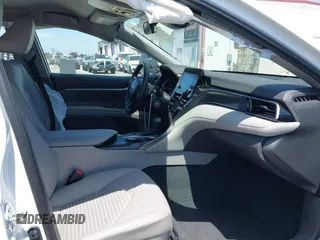 2023 Toyota Camry SE with VIN 4T1G11AK0PU736081, listed as a IAAI auction lot 42090419 with 32,303 mi miles and . Bid and sale history available at DreamBid. Image 5.