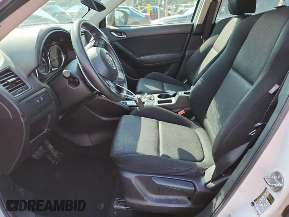 2016 Mazda CX-5 Sport with VIN JM3KE4BYXG0704194, listed as a Copart auction lot 62095735 with 93,970 mi miles and Salvage title. Bid and sale history available at DreamBid. Image 7.