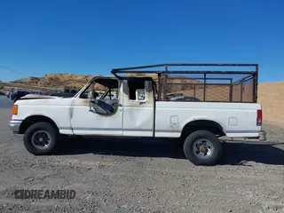 1988 Ford F-150 with VIN 1FTEX14N9JKB33407, listed as a IAAI auction lot 41278671 with 1 mi miles. Bid and sale history available at carsss.com. Image 13.