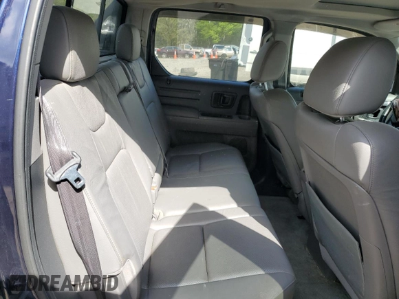 2013 Honda Ridgeline RTL z VIN 5FPYK1F58DB018217, wystawiony jako Copart lot #51644425 z przebiegiem 152 298 mil mil oraz Szkoda całkowita • Salvage title. Historia ofert i sprzedaży dostępna na DreamBid. Obrazek 10.