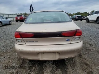 1997 Ford Escort LX with VIN 1FALP13P2VW326223, listed as a Copart auction lot 74509294 with 55,265 mi miles and Salvage Title. Bid and sale history available at carsss.com. Image 6.