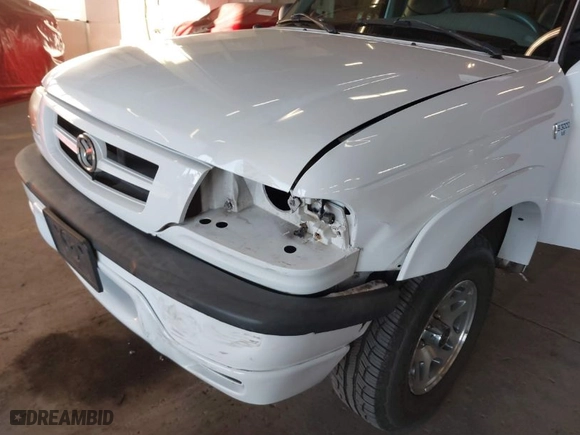 2002 Mazda B-Series 2WD Truck DS with VIN 4F4YR16V42TM25828, listed as a IAAI auction lot 41440414 with 132,334 mi miles. Bid and sale history available at carsss.com. Image 12.