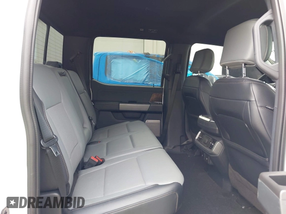2022 Ford F-150 Lightning Pro with VIN 1FTVW1EL3NWG16132, listed as a IAAI auction lot 42362459 with 16,509 mi miles and . Bid and sale history available at DreamBid. Image 8.
