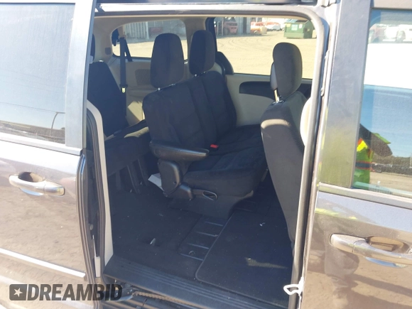 2017 Dodge Grand Caravan SE with VIN 2C4RDGBG6HR567961, listed as a IAAI auction lot 41405790 with 102,437 mi miles and . Bid and sale history available at DreamBid. Image 8.