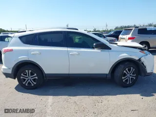 2017 Toyota RAV4 LE with VIN JTMZFREV7HJ143483, listed as a IAAI auction lot 41804683 with 129,319 mi miles. Bid and sale history available at carsss.com. Image 13.
