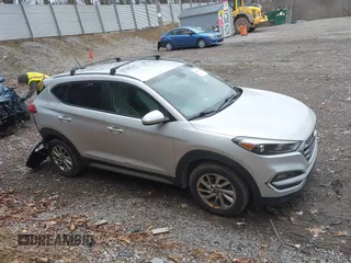 2017 Hyundai Tucson SE with VIN KM8J3CA45HU272171, listed as a IAAI auction lot 41801230 with 100,541 mi miles. Bid and sale history available at carsss.com. Image 14.