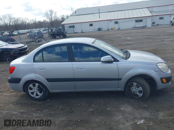 2009 Kia Rio LX with VIN KNADE223796521410, listed as a IAAI auction lot 41887883 with 82,360 mi miles and . Bid and sale history available at DreamBid. Image 12.