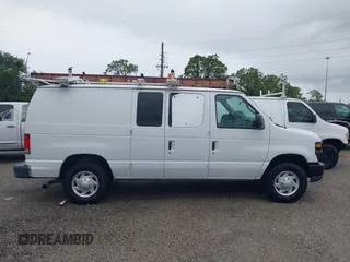 2014 Ford Econoline Cargo Commercial z VIN 1FTNE2ELXEDA12338, wystawiony jako IAAI lot #42119983 z przebiegiem 99 394 mil mil oraz . Historia ofert i sprzedaży dostępna na DreamBid. Obrazek 13.
